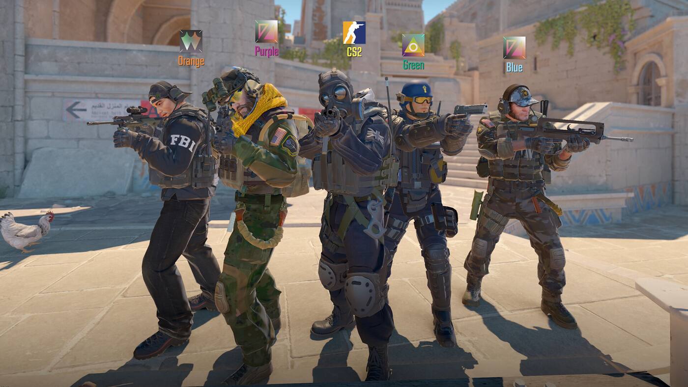 Five Counter-Terrorists standing in a row in Counter-Strike 2, each labelled above the head with a coloured tag: Orange, Purple, CS2, Green and Blue.