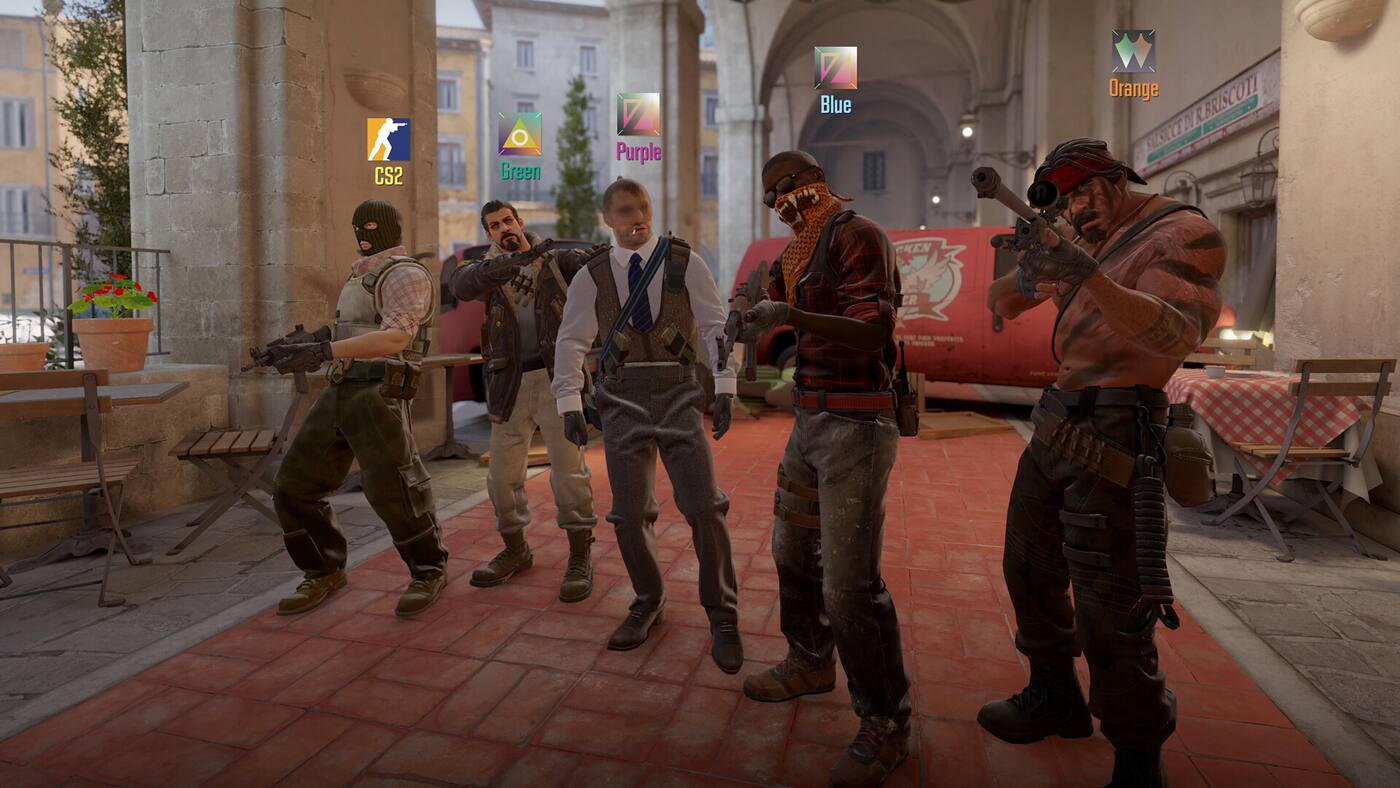 Five Terrorists standing in a row in Counter-Strike 2, each labelled above the head with a coloured tag: CS2, Green, Purple, Blue and Orange.